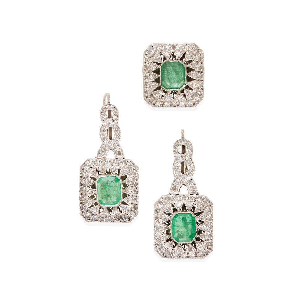 EMERALD AND DIAMOND SET: EMERALD AND DIAMOND SET • Pair of earrings with white precious metal alloy composed primarily of silver with palladium and minor gold content, with numerous round diamonds weighing