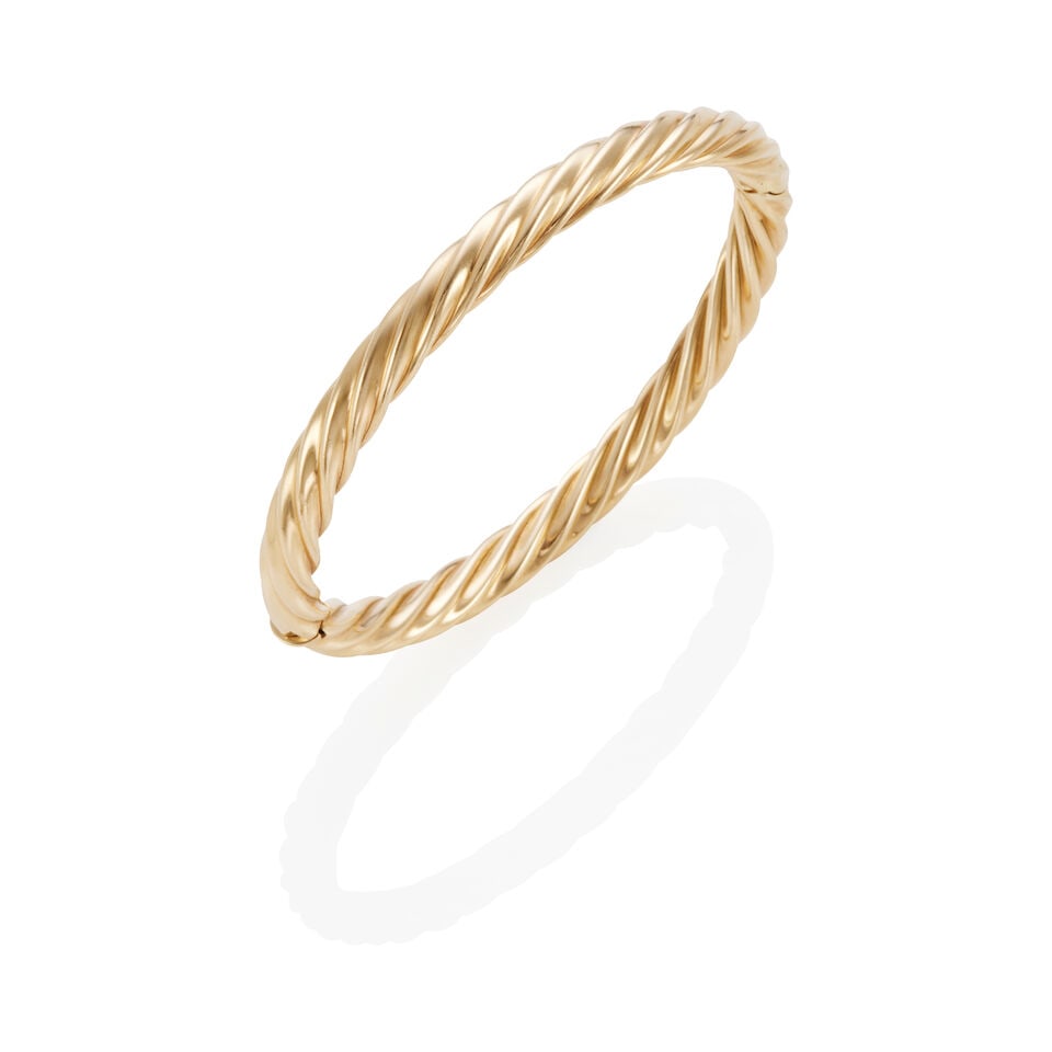 14K GOLD BANGLE BRACELET: 14K GOLD BANGLE BRACELET • 14k yellow gold • Inner circumference 7 in. • Estimated gross weight: 23.0 grams Footnotes: Overall condition, very good Metal stamped and tested for 14k