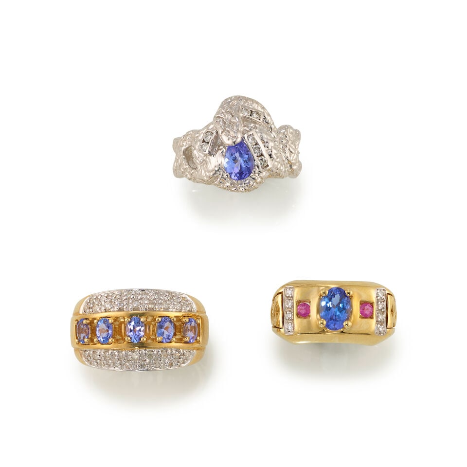 THREE 18K GOLD, TANZANITE, AND DIAMOND RINGS: THREE 18K GOLD, TANZANITE, AND DIAMOND RINGS • One 18K yellow gold ring with 5 oval shaped tanzanite weighing approximately 0.50 carat total, with numerous round shaped diamonds weighing