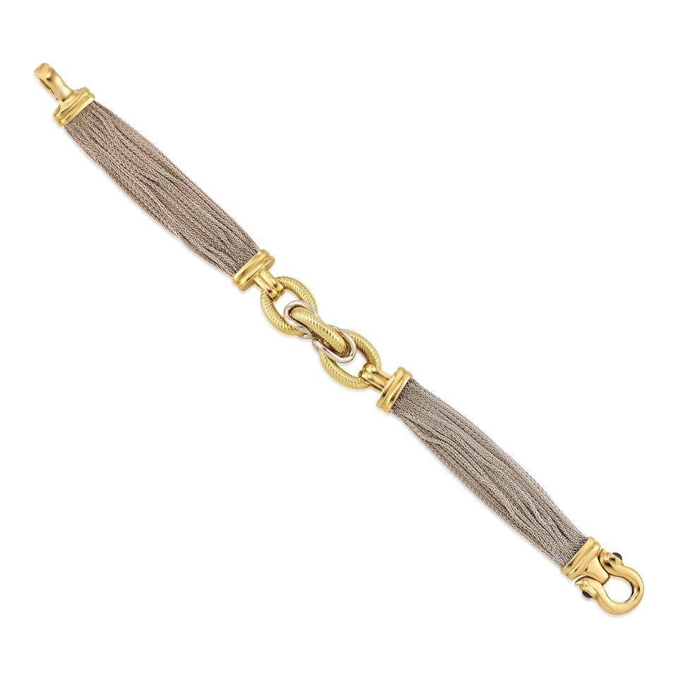14K BICOLORED GOLD BRACELET: 14K BICOLORED GOLD BRACELET • 14K white and yellow gold • Two cabochon sapphires on clasp measuring approximately 3.39mm in diameter • Length 7 1/4 in. • Estimated gross