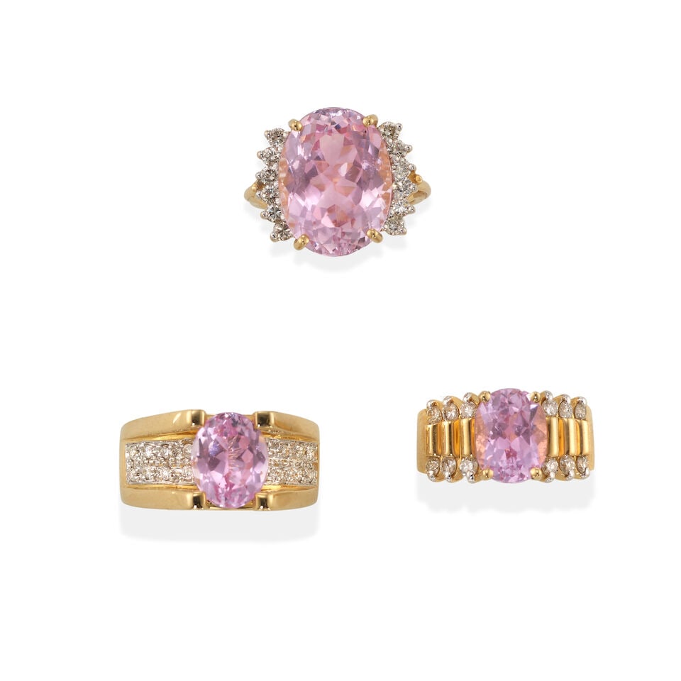 THREE 14K GOLD, KUNZITE, AND DIAMOND RINGS: THREE 14K GOLD, KUNZITE, AND DIAMOND RINGS • One 14K yellow gold ring with an oval shaped kunzite weighing approximately 8.30 carats, with 12 round shaped diamonds weighing approximately 0.25