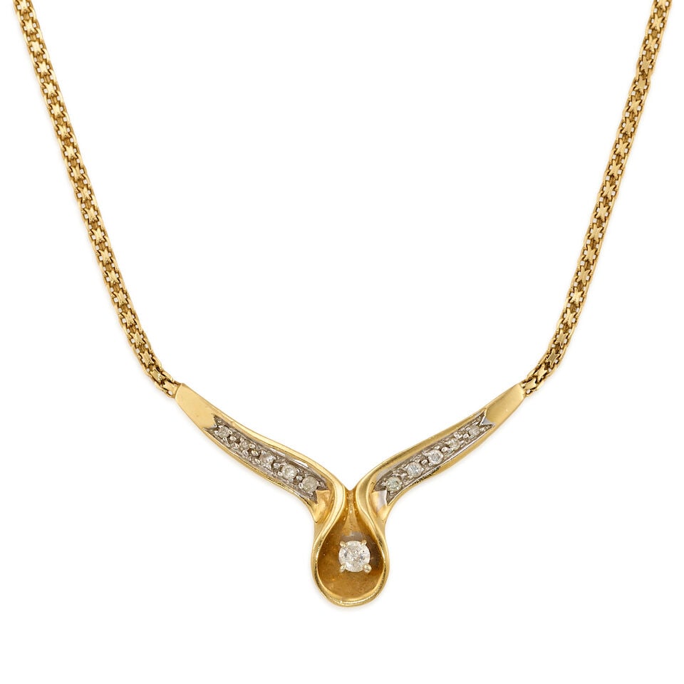14K GOLD AND DIAMOND NECKLACE: 14K GOLD AND DIAMOND NECKLACE • 14K yellow gold • 11 round shaped diamonds weighing approximately 0.25 carat total • Pendant measures 1 3/4 in. x 9/16 in. • Length 14 in. ̶