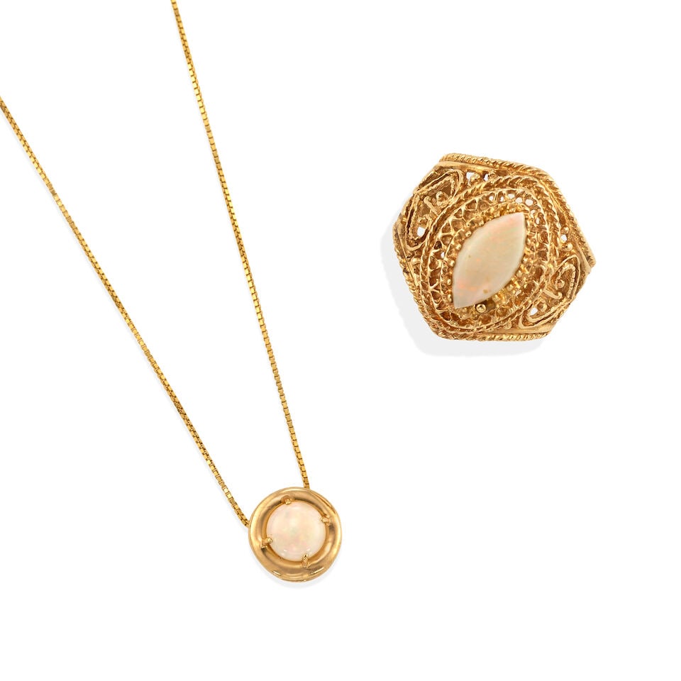 10K GOLD AND OPAL RING AND PENDANT NECKLACE: 10K GOLD AND OPAL RING AND PENDANT NECKLACE • One 10K yellow gold ring with a marquise shaped opal measuring approximately 11.82mm x 5.63mm x 2.43mm, size 7 • One 10K yellow gold pendant