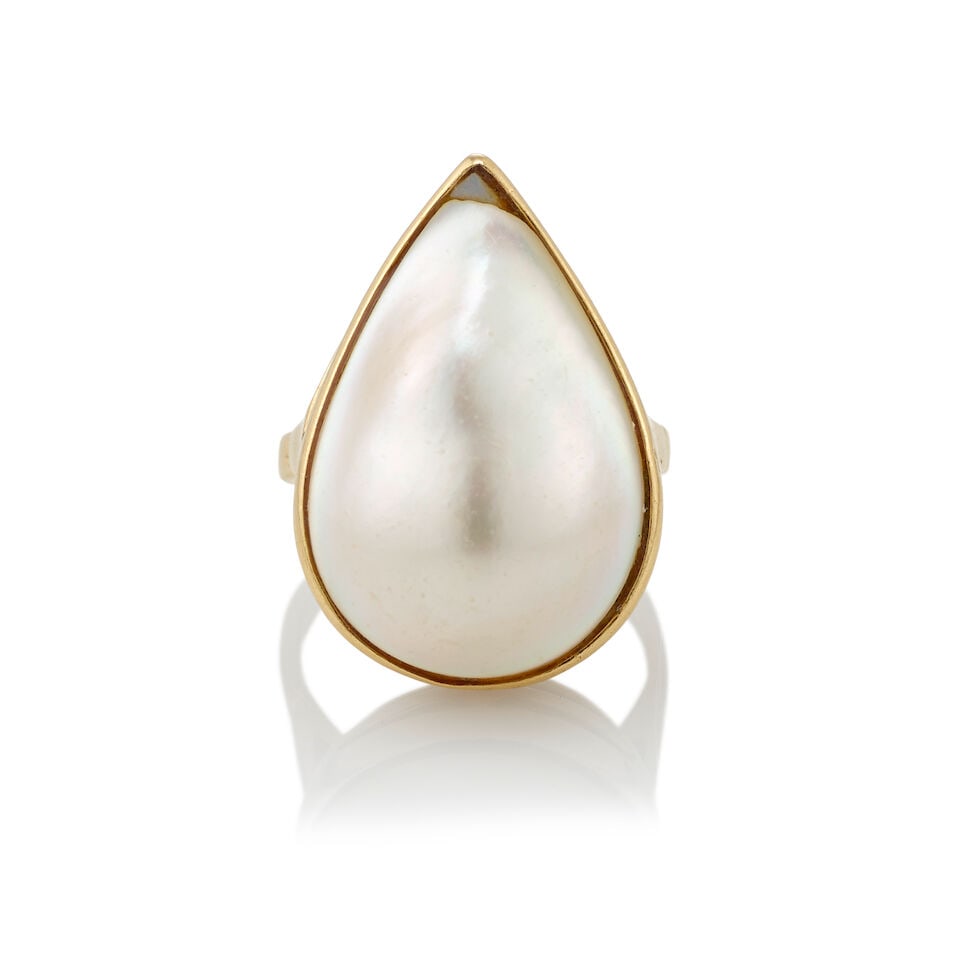 14K GOLD AND CULTURED PEARL RING: 14K GOLD AND CULTURED PEARL RING • 14K yellow gold • One pear shaped cultured pearl measuring approximately 23.93mm x 16.78mm x 9.24mm • Size 6 3/4 • Estimated gross weight: