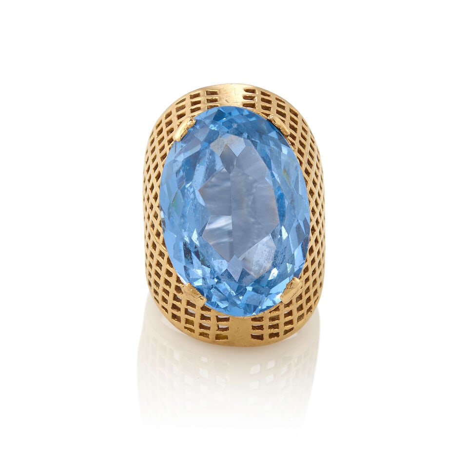 14K GOLD AND GLASS RING: 14K GOLD AND GLASS RING • 14K yellow gold • One oval shaped glass measuring approximately 24.10mm x 17.00mm x 9.59mm • Size 6 3/4 • Estimated gross weight: 18.1