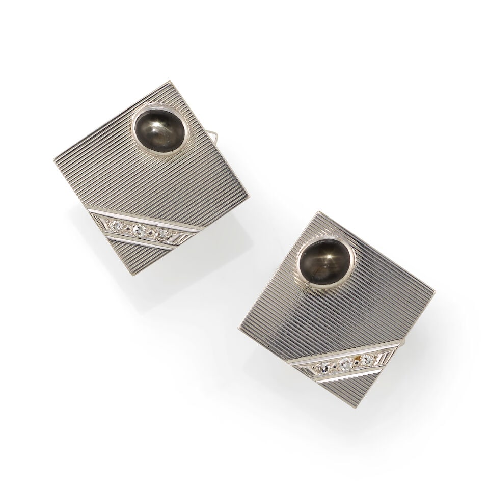 14K GOLD, SAPPHIRE, AND DIAMOND CUFFLINKS: 14K GOLD, SAPPHIRE, AND DIAMOND CUFFLINKS • 14K white gold • Two cabochon sapphires measuring approximately 6.83mm x 6.01mm x depth cannot be determined due to the setting • 6 round