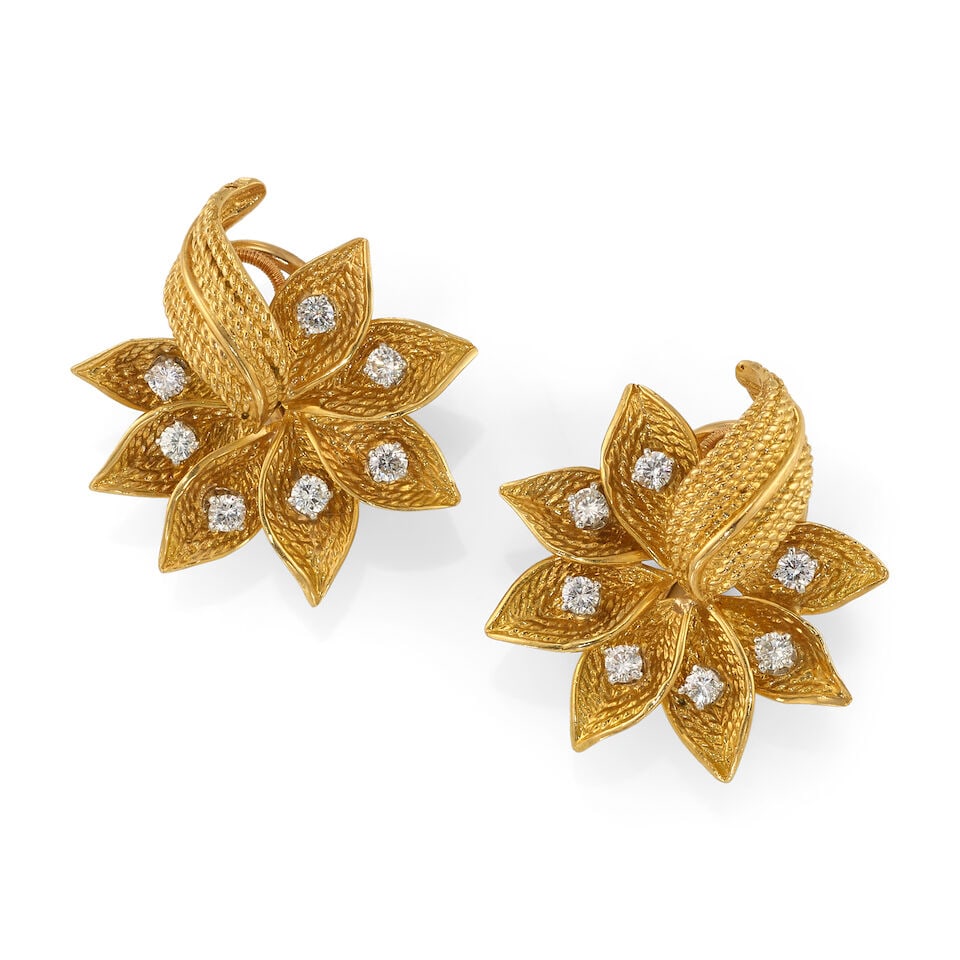 GOLD AND DIAMOND EARRINGS: GOLD AND DIAMOND EARRINGS • 14K and 18K yellow gold • Numerous round shaped diamonds weighing approximately 0.55 carat total • Measures 1 1/8 in. x 1 in. • Estimated gross weig