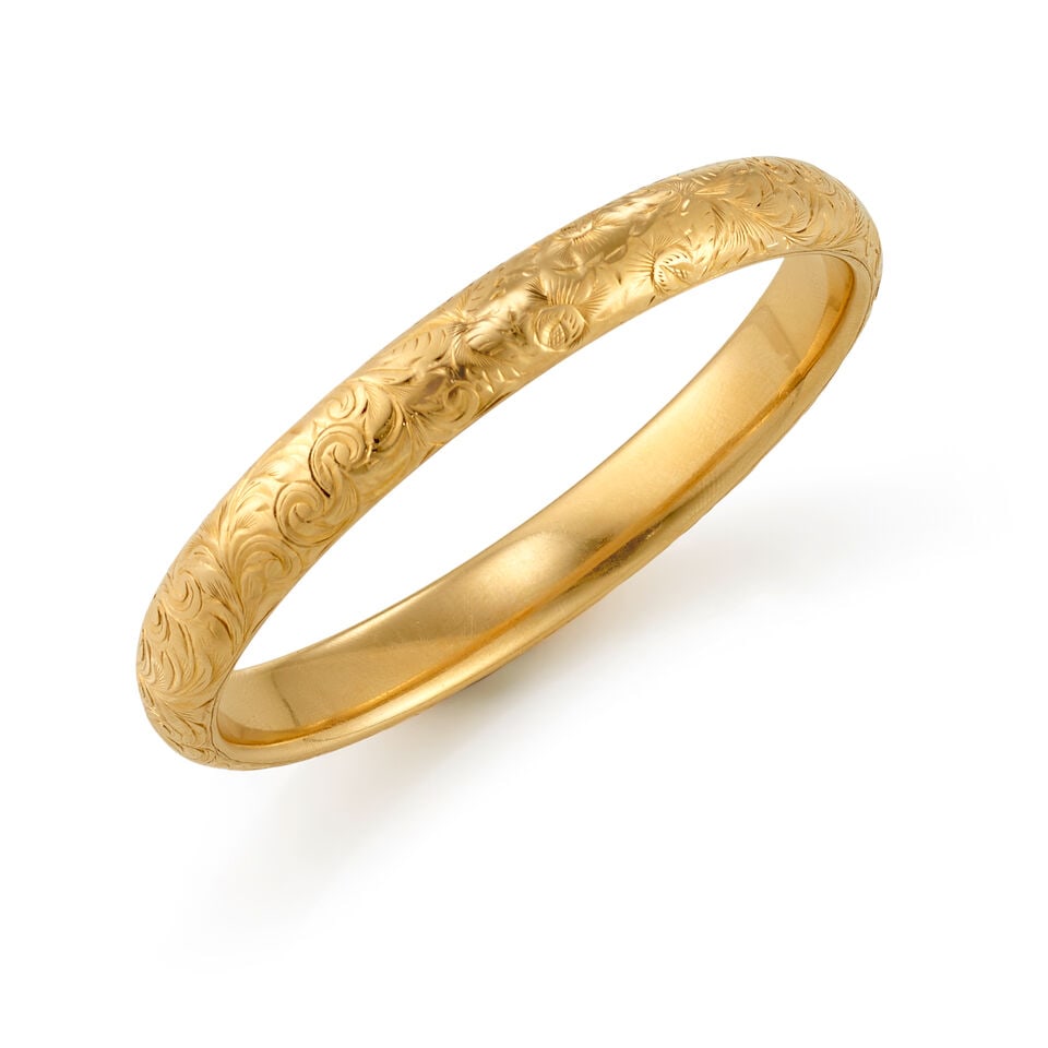 14K GOLD BANGLE: 14K GOLD BANGLE • 14K yellow gold • Inner circumference 7 1/2 in. • Estimated gross weight: 15.8 grams Footnotes: Overall condition, good Metal stamped and tested for 14K