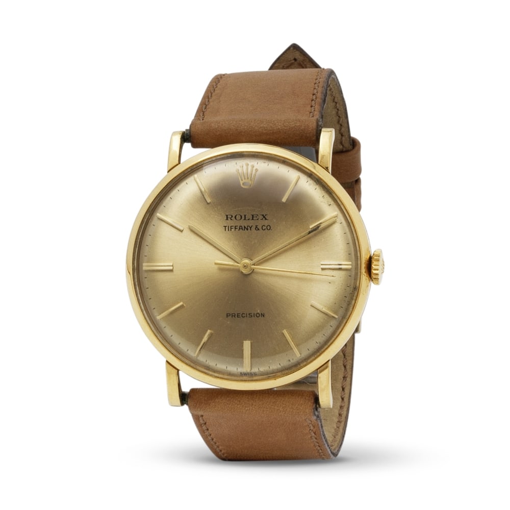 Rolex. A fine and rare 18K gold manual wind wristwatch retailed by Tiffany & Co. Rolex. Belle et... (1 of 1)