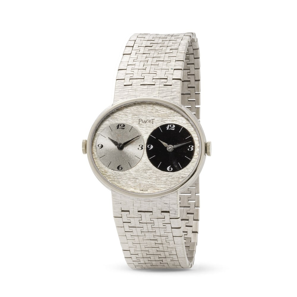 Piaget. A fine and rare 18K white gold manual wind dual time bracelet watch Piaget. Montre brace...: Piaget. A fine and rare 18K white gold manual wind dual time bracelet watch Piaget. Montre bracelet en or blanc 18K (750) avec deux cadrans mouvement mécanique Model: Altiplano Reference: 612501 