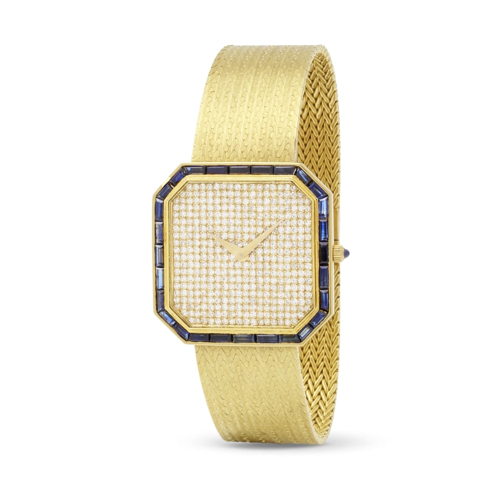 Vacheron Constantin. A fine 18K gold manual wind bracelet watch with diamond set dial and baguet...: Vacheron Constantin. A fine 18K gold manual wind bracelet watch with diamond set dial and baguette cut sapphires to bezel Vacheron Constantin. Belle montre bracelet en or jaune 18K (750) sertie de dia