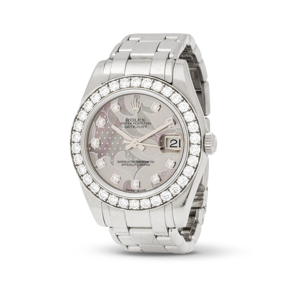 Rolex. A fine 18K white gold automatic calendar bracelet watch with diamond set bezel and mother... (1 of 1)