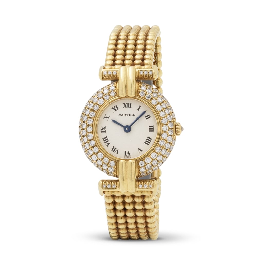 Cartier. A lady's 18K gold quartz bracelet watch with diamond set bezel Cartier. Montre bracelet...: Cartier. A lady's 18K gold quartz bracelet watch with diamond set bezel Cartier. Montre bracelet de dame en or jaune 18K (750) sertie de diamants mouvement quartz Model: Colisée Reference: 881092