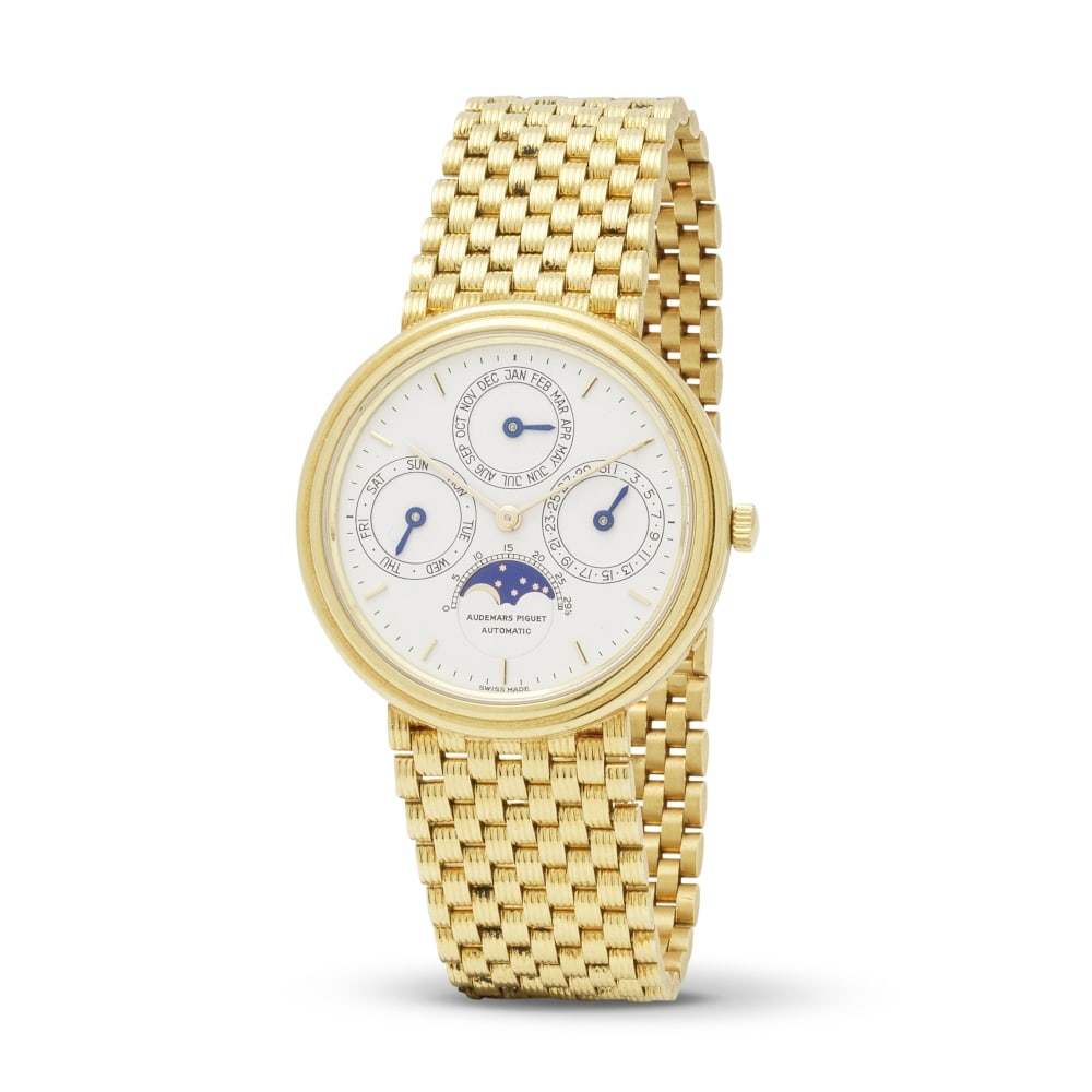 Audemars Piguet. A very fine and rare 18K gold automatic perpetual calendar bracelet watch with ... (1 of 1)