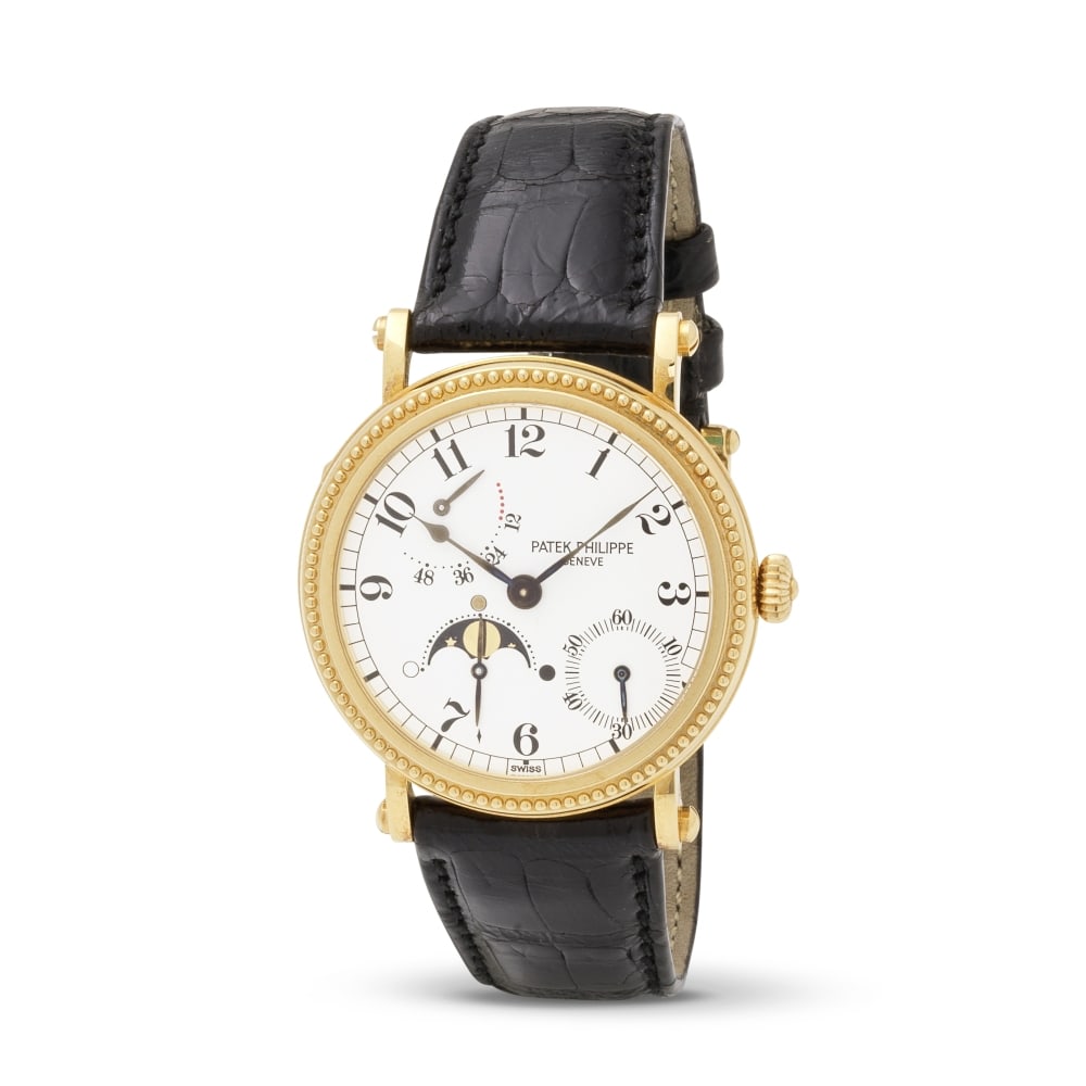 Patek Philippe. A fine and rare new old stock 18K gold automatic wristwatch with power reserve a...: Patek Philippe. A fine and rare new old stock 18K gold automatic wristwatch with power reserve and moon phase indication Patek Philippe. Belle et rare montre bracelet en or jaune 18K (750) avec indica