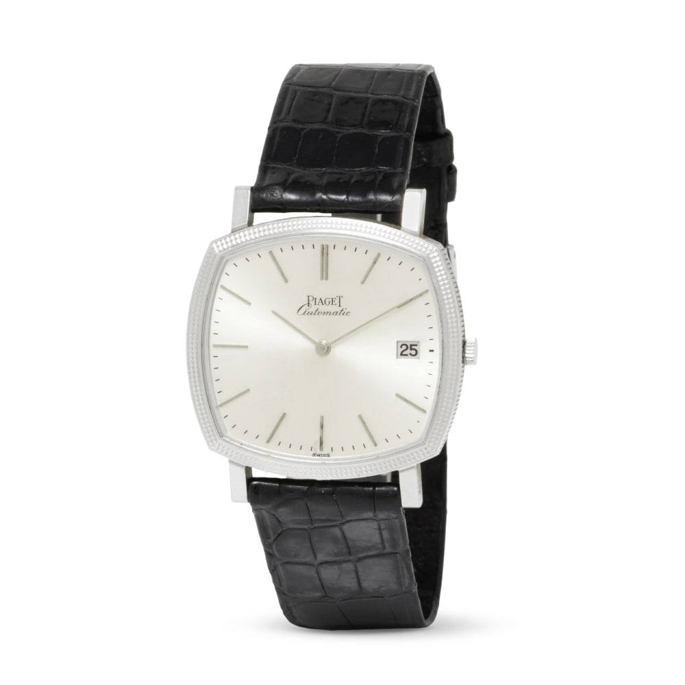 Piaget. An 18K white gold automatic calendar wristwatch Piaget. Montre bracelet en or blanc 18K ...: Piaget. An 18K white gold automatic calendar wristwatch Piaget. Montre bracelet en or blanc 18K (750) avec date mouvement automatique Reference: 13409 Date: Circa 1970 Movement: 30-jewel Cal.12PCI, 24