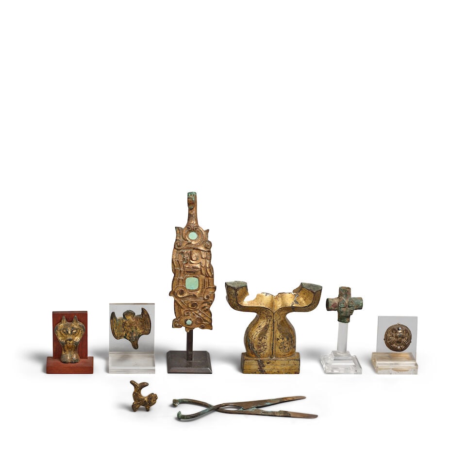 NINE EARLY BRONZE AND GILT BRONZE ARTIFACTS Western Zhou dynasty to Tang dynasty (9) (1 of 2)