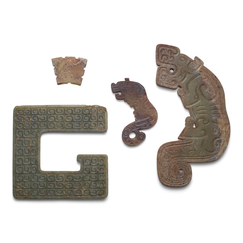 FOUR ARCHAIC-STYLE JADE ORNAMENTS 20th century (4) (1 of 1)