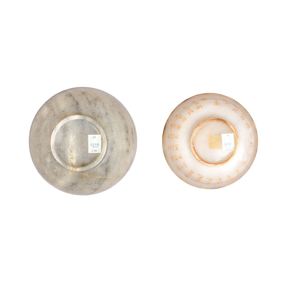TWO IMPERIAL-STYLE JADE BOWLS 20th century; the gray bowl with Qianlong yuzhi mark; the white in... - 2