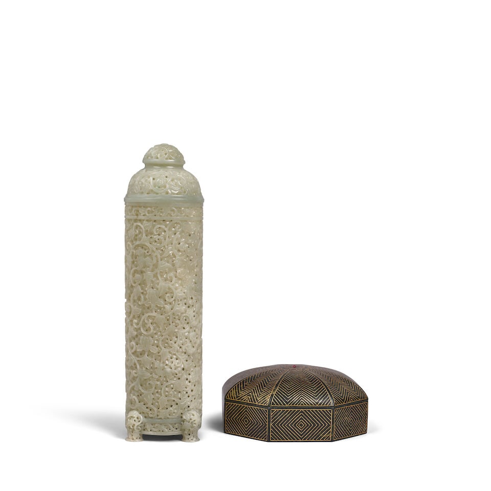 TWO MUGHAL-STYLE JADE CARVINGS OF CONTAINERS 20th century (2): TWO MUGHAL-STYLE JADE CARVINGS OF CONTAINERS 20th century Comprising: an openwork celadon jade cylindrical incense holder and associated cover; and an octagonal spinach-color jade box and cover with m