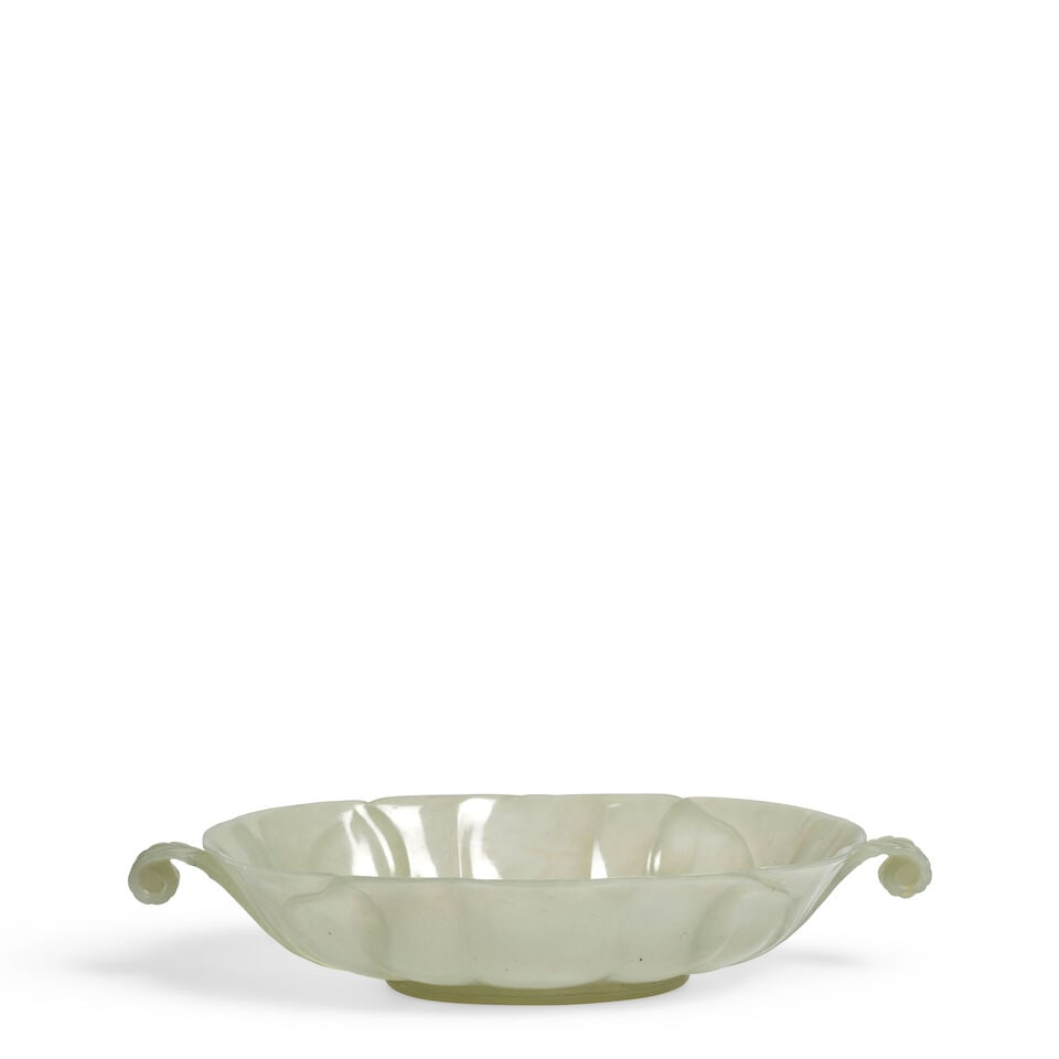 A MUGHAL-STYLE CELADON JADE OVAL MELLOW-FORM DISH WITH LEAF HANDLES 20th century (1 of 2)