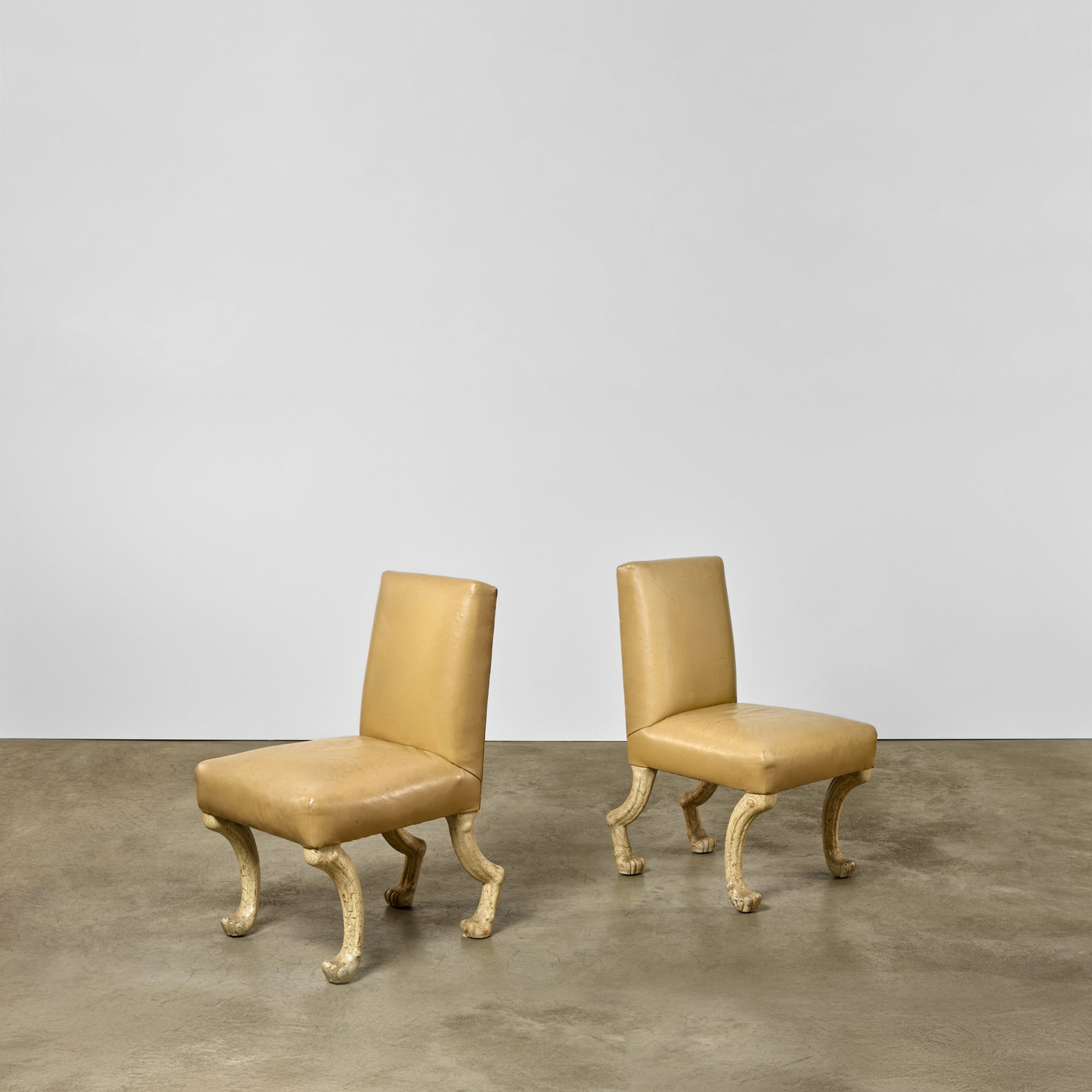 JOHN DICKINSON (1920-1982) Pair of 'Etruscan' Chairscirca 1975carved walnut, craquelure paint, c... (1 of 1)