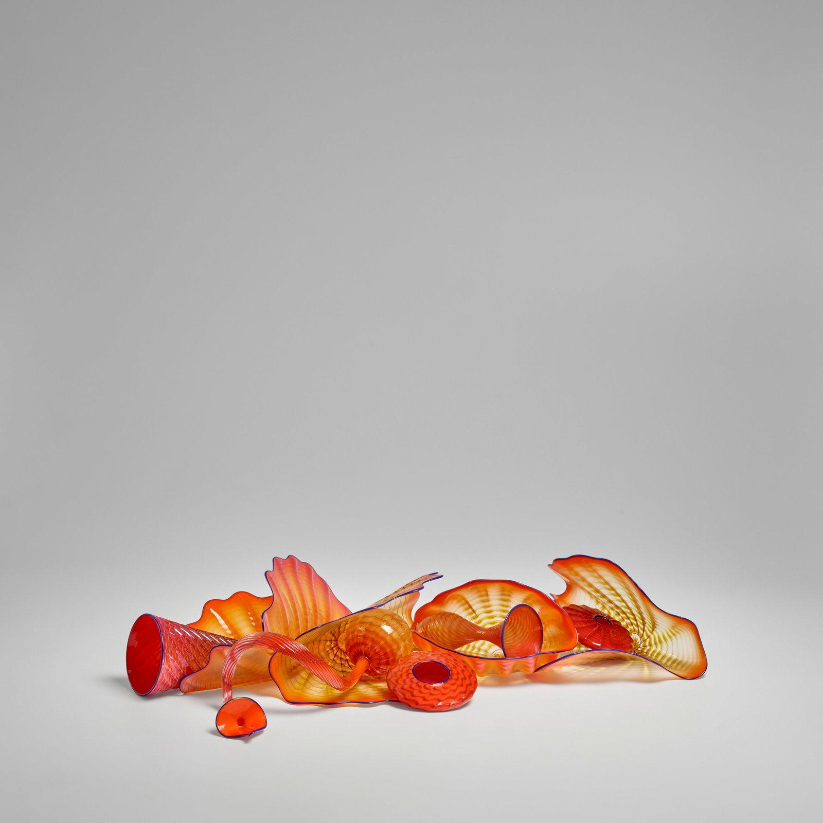 DALE CHIHULY (BORN 1941) Crimson Orange Persian Set with Sapphire Lip Wraps2000blown glass, one ... (1 of 1)