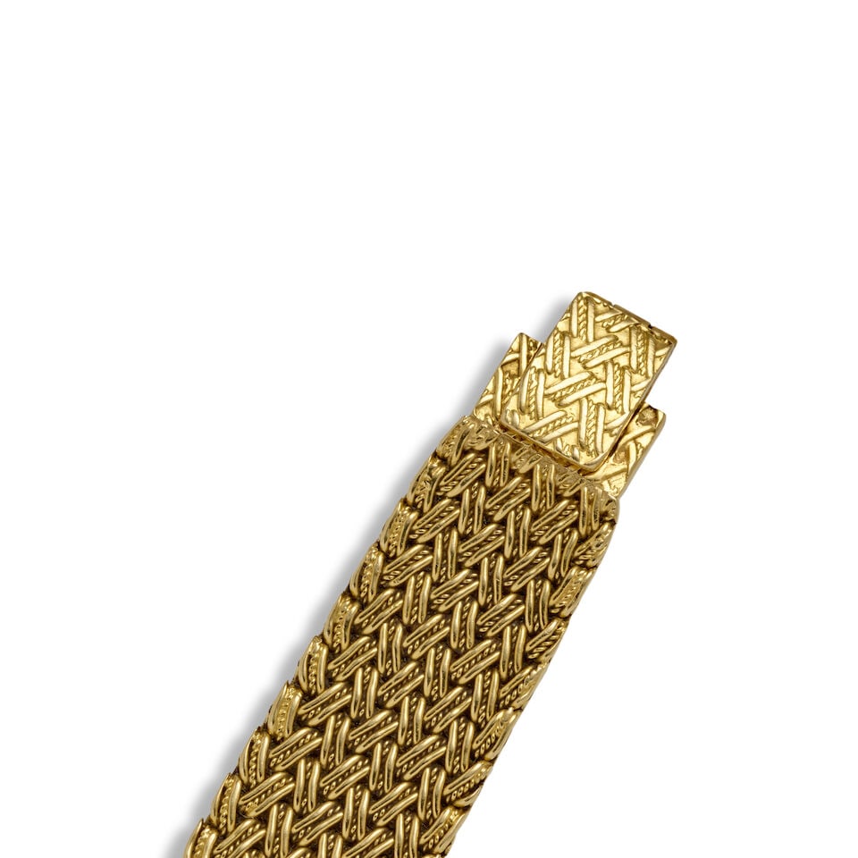 PIAGET. AN 18K GOLD BACKWIND BRACELET WATCHRef: 3813 D 1, c. 1970s - 3