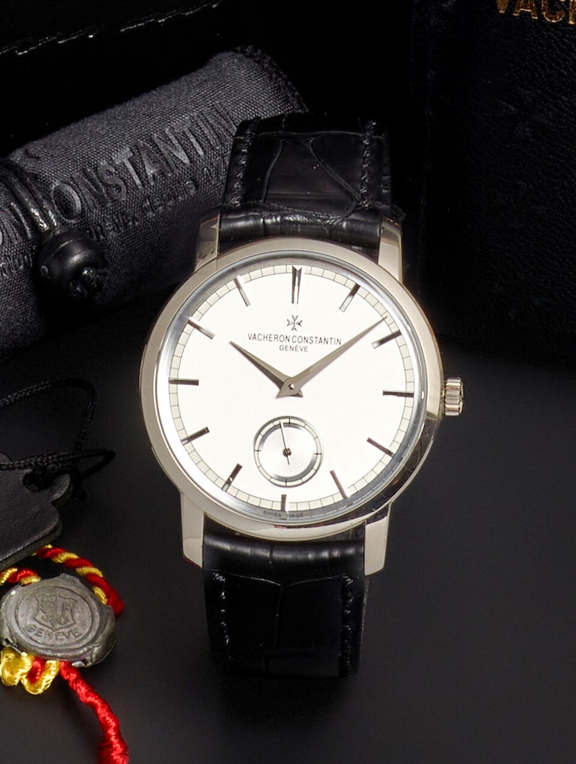 VACHERON CONSTANTIN. AN 18K WHITE GOLD MANUAL WIND WRISTWATCH Traditionelle, Ref: 82172/000G-938...: VACHERON CONSTANTIN. AN 18K WHITE GOLD MANUAL WIND WRISTWATCH Model: Traditionelle Reference: 82172/000G-9383 Date: Purchased 15th August, 2011 Movement: Cal. 4400/1, 21-jewel manual wind, Geneva Seal
