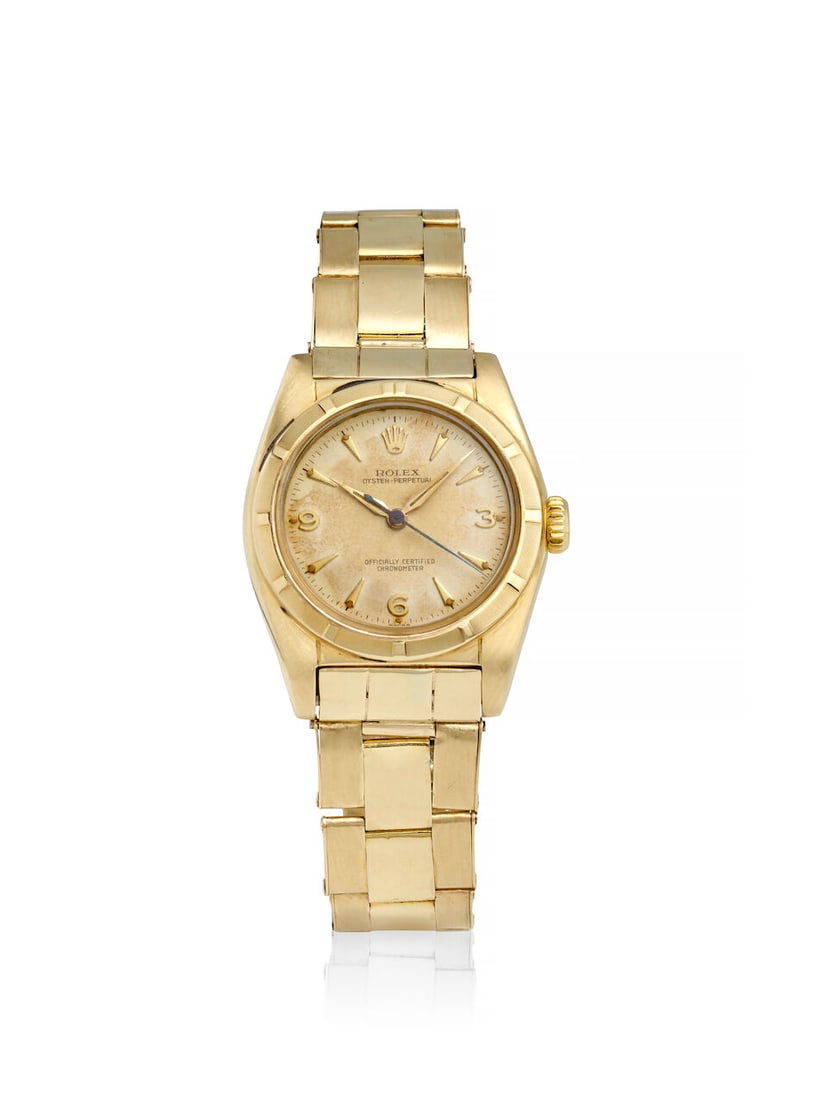 ROLEX. A 14K GOLD AUTOMATIC BRACELET WATCH Oyster Perpetual 'Bubbleback', Ref: 6011, c. 1950s (1 of 2)