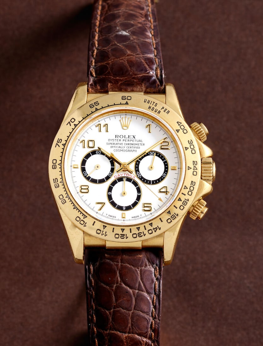 ROLEX. AN 18K GOLD AUTOMATIC CHRONOGRAPH WRISTWATCH Cosmograph Daytona 'Zenith', Ref: 16518, c. ... (1 of 4)