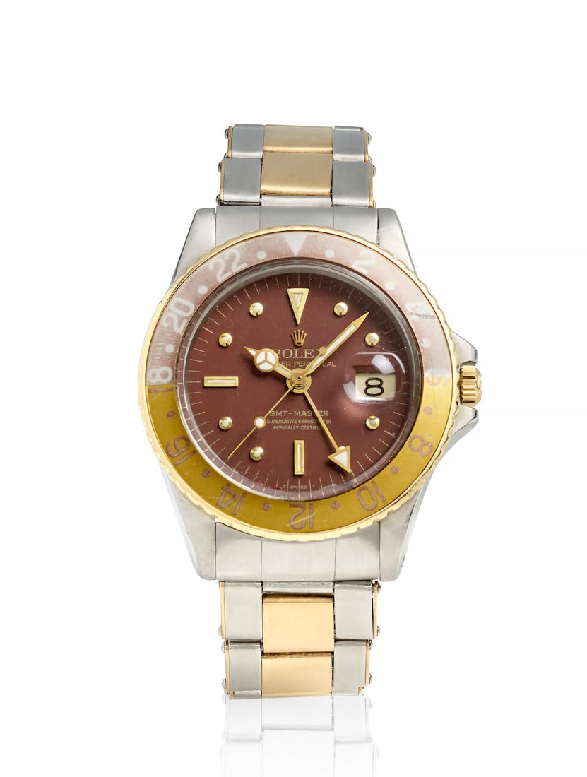 ROLEX. A STAINLESS STEEL AND GOLD AUTOMATIC CALENDAR BRACELET WATCH WITH DUAL TIME ZONE GMT-Mast... (1 of 2)