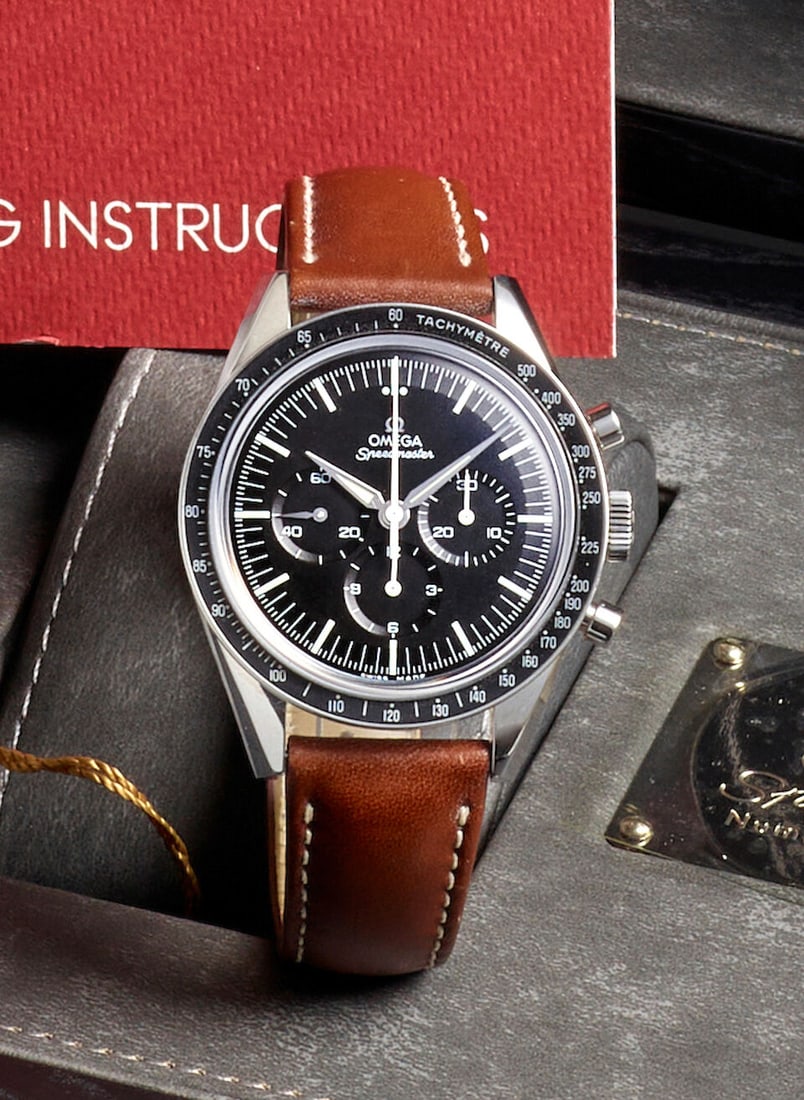 OMEGA. A STAINLESS STEEL MANUAL WIND CHRONOGRAPH WRISTWATCH Speedmaster 'First Omega In Space', ...: OMEGA. A STAINLESS STEEL MANUAL WIND CHRONOGRAPH WRISTWATCH Model: Speedmaster 'First Omega In Space' Reference: 311.32.40.30.01.001 Date: Purchased 8th October, 2014 Movement: Cal. 1861, 18-jewel man