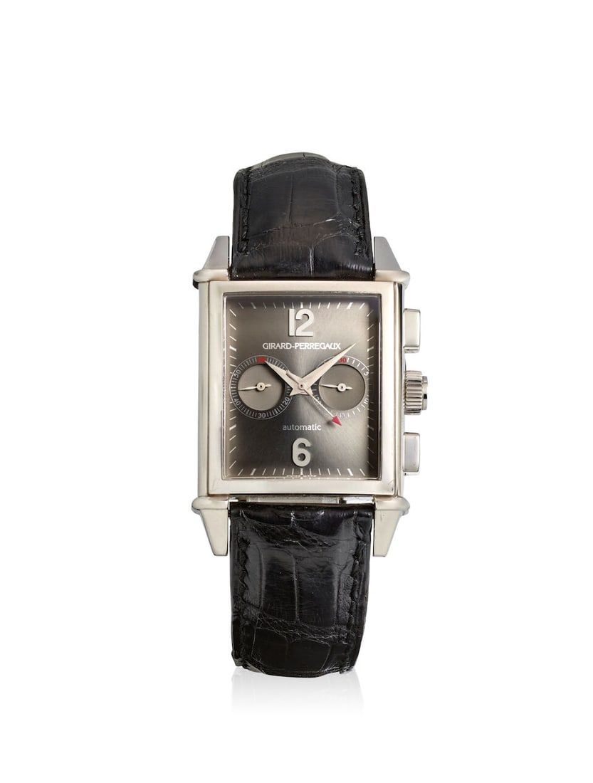GIRARD-PERREGAUX. A PLATINUM AUTOMATIC CHRONOGRAPH WRISTWATCH Vintage 1945, Ref: 2599, c. 2000s: GIRARD-PERREGAUX. A PLATINUM AUTOMATIC CHRONOGRAPH WRISTWATCH Model: Vintage 1945 Reference: 2599 Date: c. 2000s Movement: 38-jewel automatic Dial: Grey Case: Rectangular, case back secured by 4