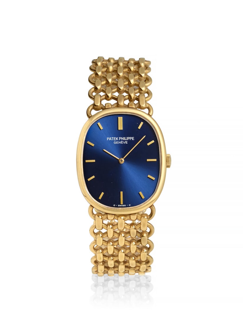 PATEK PHILIPPE. AN 18K GOLD MANUAL WIND BRACELET WATCH Ellipse, Ref: 3848J/1, c. 1970s: PATEK PHILIPPE. AN 18K GOLD MANUAL WIND BRACELET WATCH Model: Ellipse Reference: 3848J/1 Date: c. 1970s Movement: Cal. 215, 18-jewel manual, Geneva Seal, no. 1'322'653 Dial: Blue Case: Oval, snap on