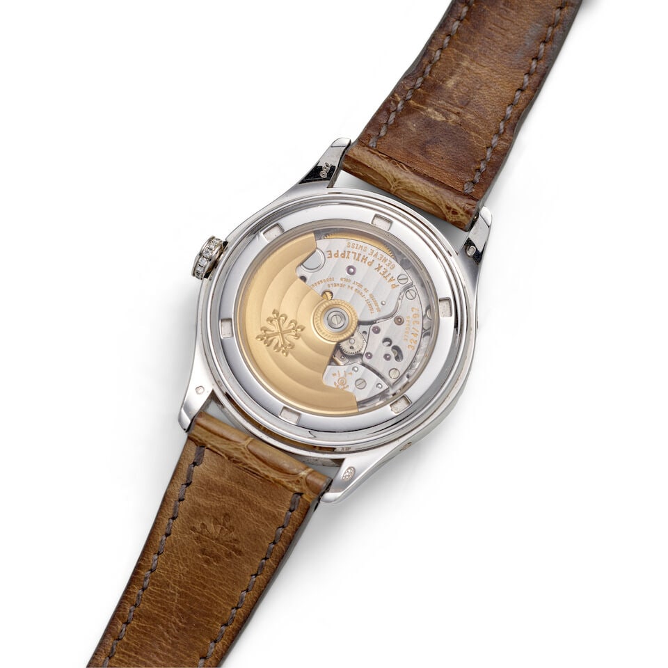 PATEK PHILIPPE, RETAILED BY TIFFANY & CO. AN 18K WHITE GOLD AND DIAMOND SET AUTOMATIC ANNUAL CAL... - 3