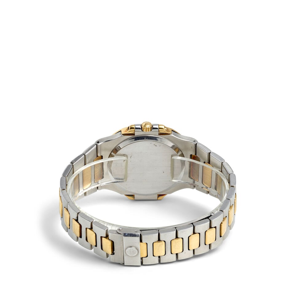 PATEK PHILIPPE. AN 18K GOLD AND STAINLESS STEEL AUTOMATIC CALENDAR BRACELET WATCH Nautilus 'Jumb... - 2