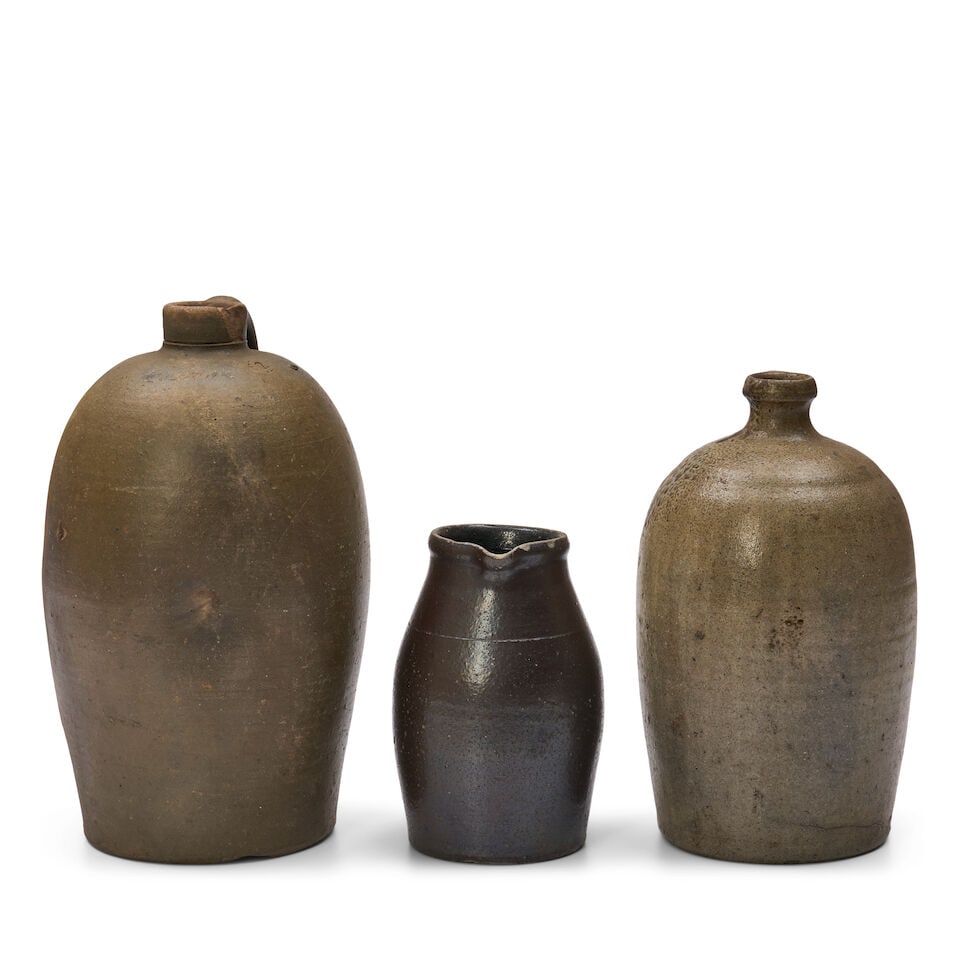 Two Stoneware Jugs and a Glazed Kentucky Pitcher United States, late 19th century - 2