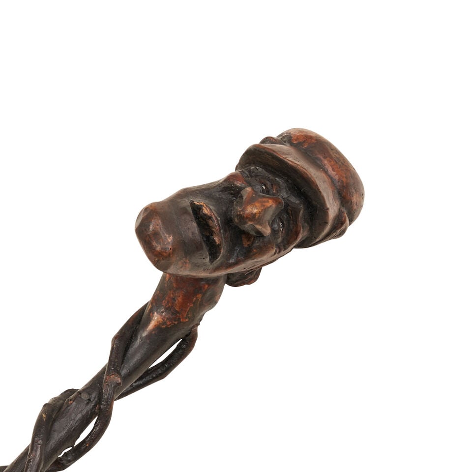 Carved and Inlaid Cane Depicting Man in Peaked Cap Italy, c. 1900 - 2