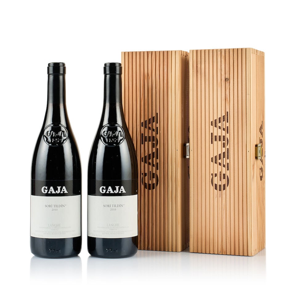 Gaja, Langhe, Sori Tildin, 2010 (2 x 750ml): Gaja, Langhe, Sori Tildin, 2010 (2 x 750ml) Region: Piedmont Fill Level: excellent Capsule: ok Cork: ok Label: 2x stained Packaging: 2x individual original wooden case Alcohol Content: 14.5% This lot