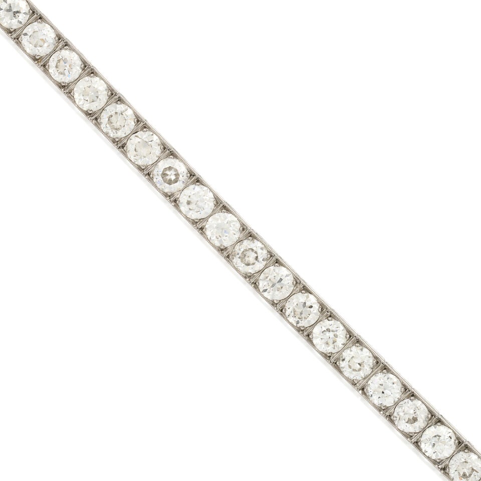 TIFFANY & CO.: AN ART DECO PLATINUM AND DIAMOND LINE BRACELET - 5