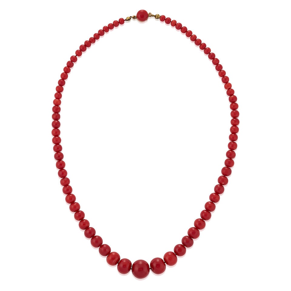 A CORAL BEAD NECKLACE: A CORAL BEAD NECKLACE Composed of coral beads graduating in size from approximately 5.00 to 14.00 mm, gross weight 27.1 dwt, length 19 3/4 in. Footnotes: Accompanied by a GIA report numbered