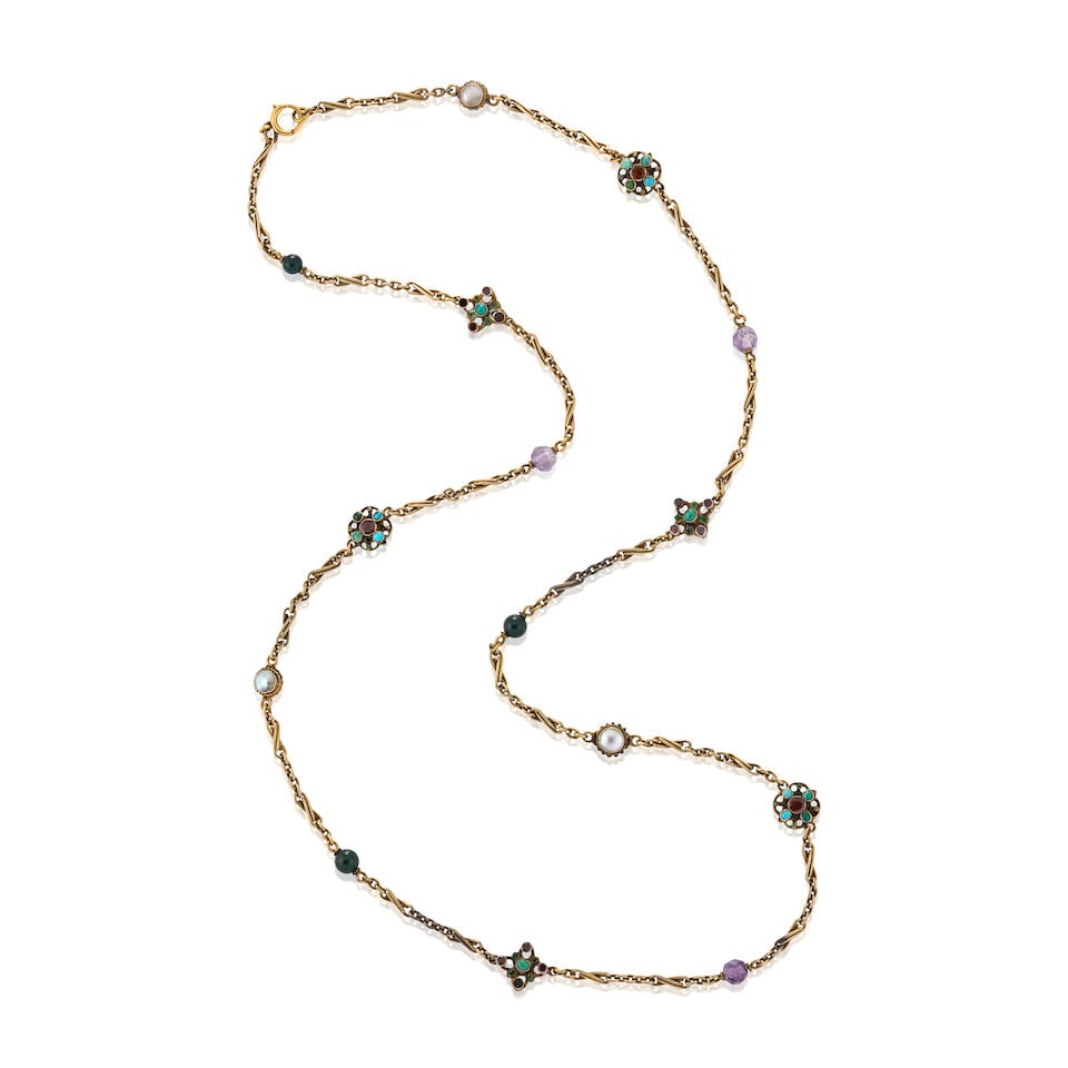 AN ANTIQUE GOLD, GEM-SET, AND ENAMEL CHAIN: AN ANTIQUE GOLD, GEM-SET, AND ENAMEL CHAIN The shaped gem-set links including garnets, turquoise, and mother-of-pearl, with bloodstone and amethyst beads, enamel accents, joined by fancy links,