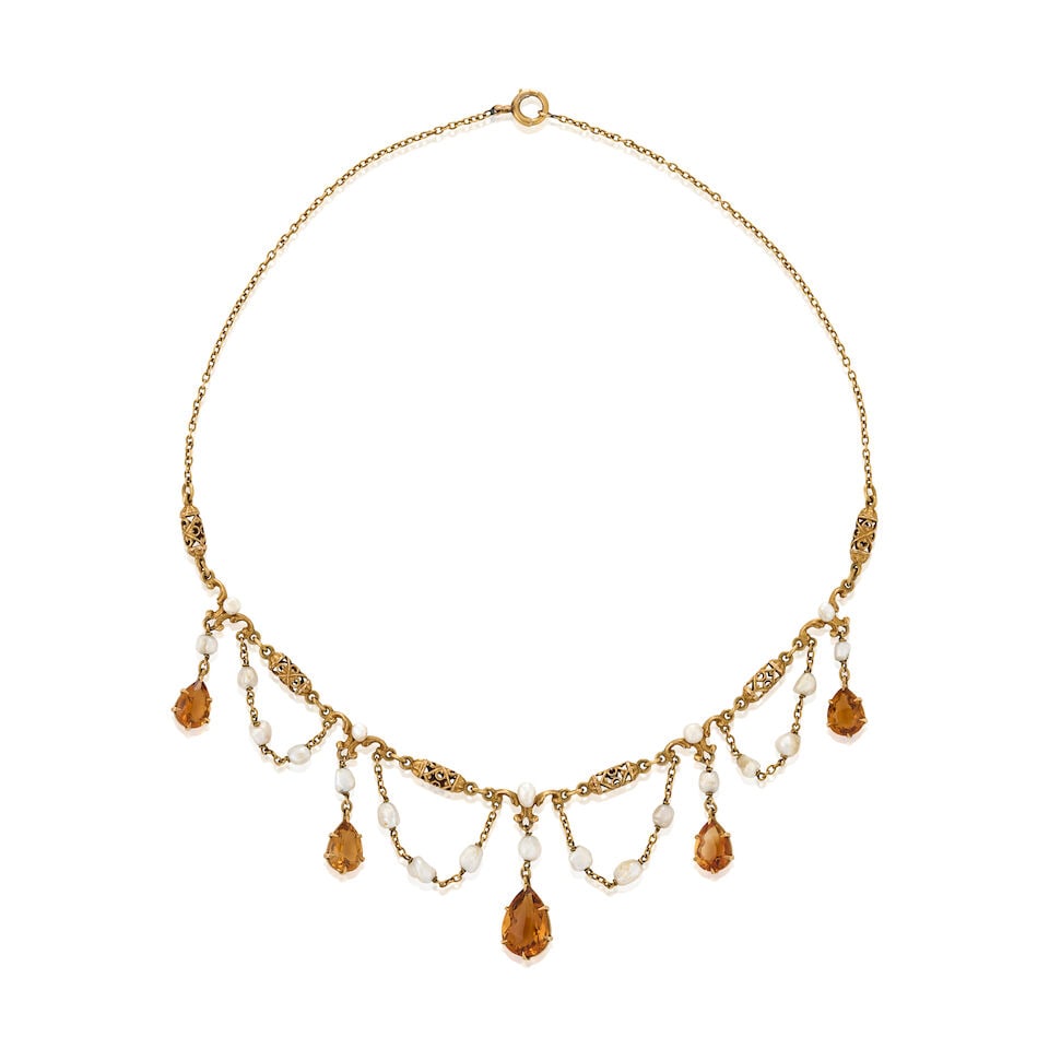 AN ANTIQUE GOLD, CITRINE, AND BAROQUE FRESHWATER PEARL NECKLACE: AN ANTIQUE GOLD, CITRINE, AND BAROQUE FRESHWATER PEARL NECKLACE The fancy link chain suspending citrine drops, graduating in size from approximately 9.10 x 6.45 x 4.10 to 12.75 x 9.00 x 6.00 mm,