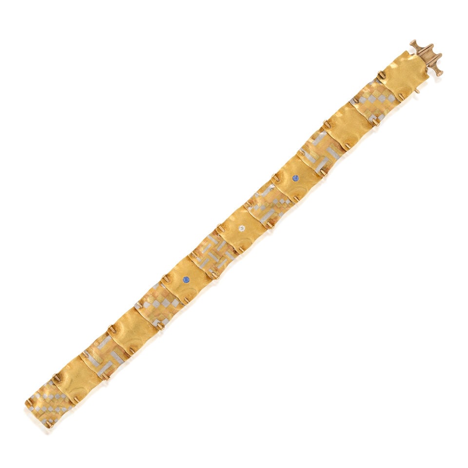 A.J. HEDGES & CO.: A MIXED METAL, SAPPHIRE, AND DIAMOND BRACELET, CIRCA 1879-1890: A.J. HEDGES & CO.: A MIXED METAL, SAPPHIRE, AND DIAMOND BRACELET, CIRCA 1879-1890 The fabric-like links in 14k yellow gold, with rose gold and platinum inlay, centering two bezel-set circular-cut sapp