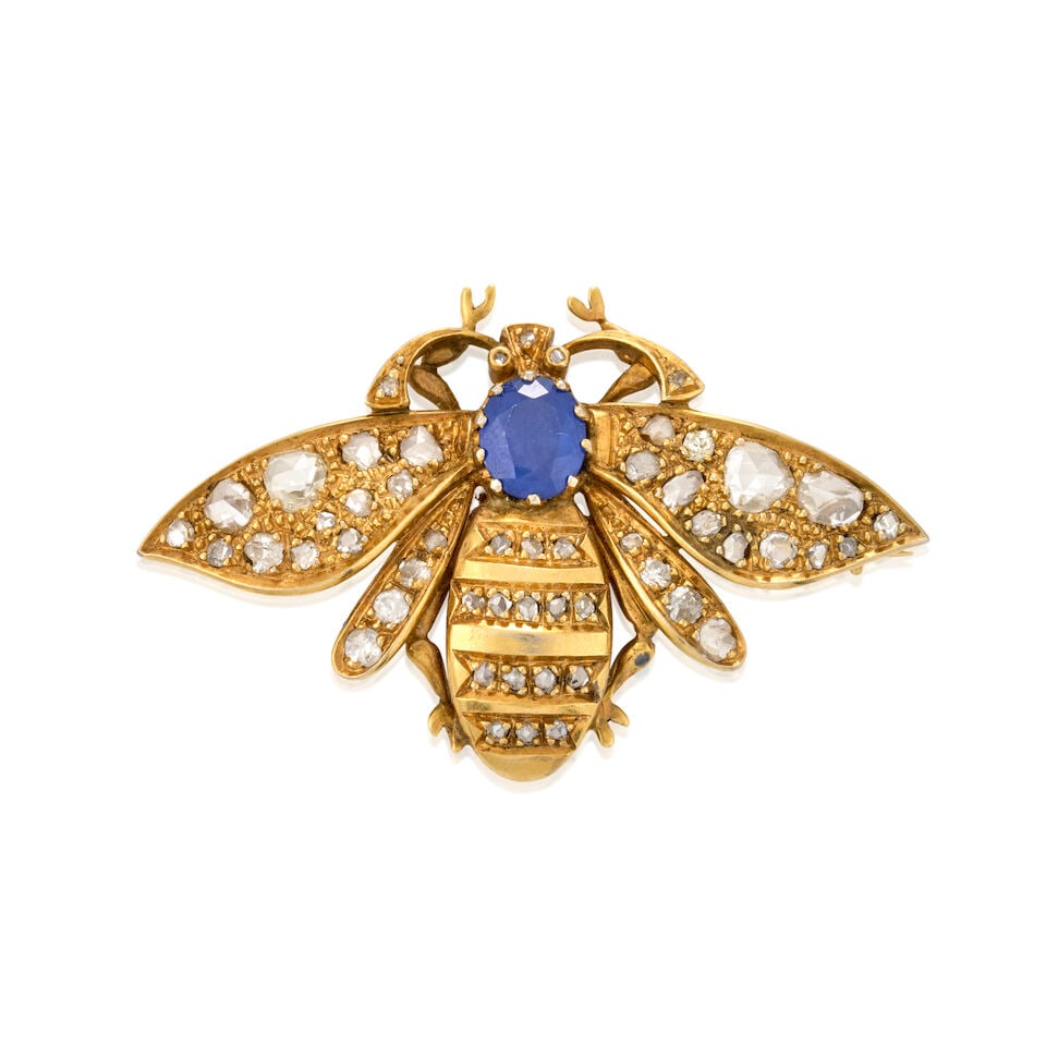 A GOLD, SAPPHIRE, AND DIAMOND INSECT BROOCH: A GOLD, SAPPHIRE, AND DIAMOND INSECT BROOCH Centering a fancy-cut sapphire measuring approximately 7.90 x 6.60 x 4.25 mm, and set with rose-cut diamonds, weight 6.2 dwt, measures 1 15/16 x 1 1/4