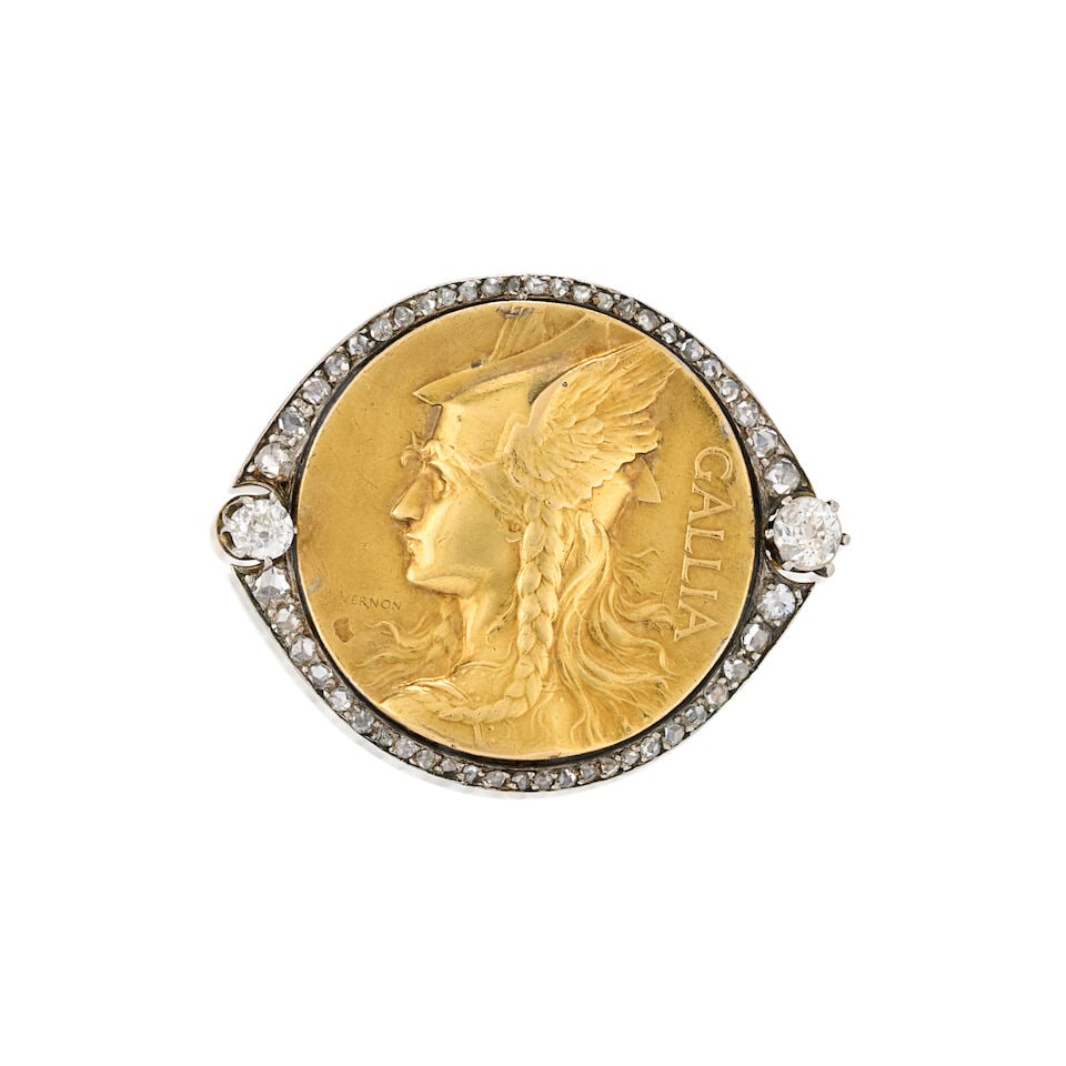 FREDERIC-CHARLES VICTOR DE VERNON: A GOLD AND DIAMOND BROOCH, FRANCE: FREDERIC-CHARLES VICTOR DE VERNON: A GOLD AND DIAMOND BROOCH, FRANCE Centering a gold medal depicting Mercury, framed by old mine and rose-cut diamonds, set in platinum-topped gold, weight 8.7 dwt,