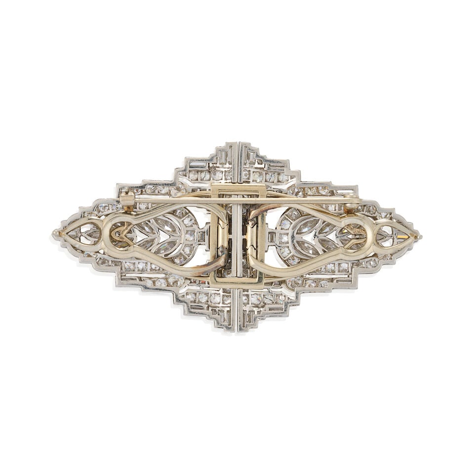 A PAIR OF PLATINUM AND DIAMOND CLIP BROOCHES, CIRCA 1940 - 5