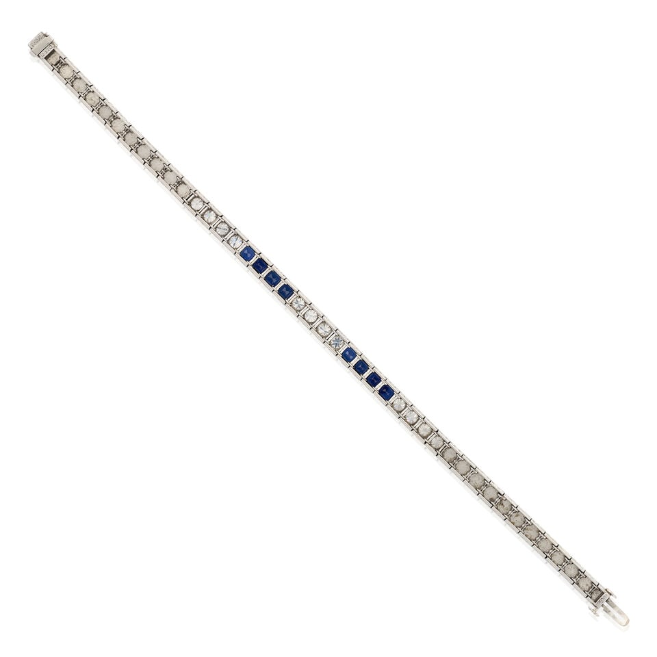J.E. CALDWELL & CO.: AN ART DECO PLATINUM, SAPPHIRE, AND DIAMOND LINE BRACELET - 2