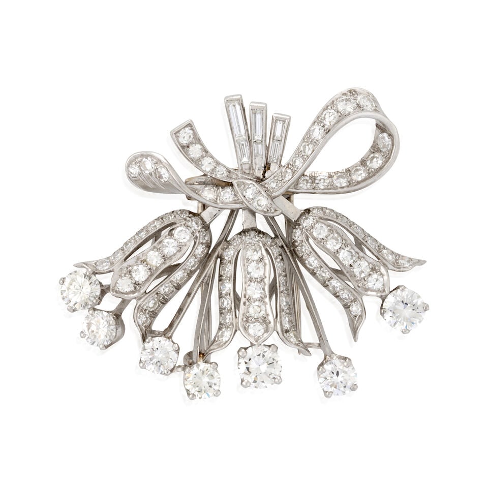 MARIANNE OSTIER: A PLATINUM AND DIAMOND BROOCH: MARIANNE OSTIER: A PLATINUM AND DIAMOND BROOCH Designed as stylized bluebells, set with full, single, and baguette-cut diamonds, approximate total weight 4.25 carats, with maker's mark for Marianne Os